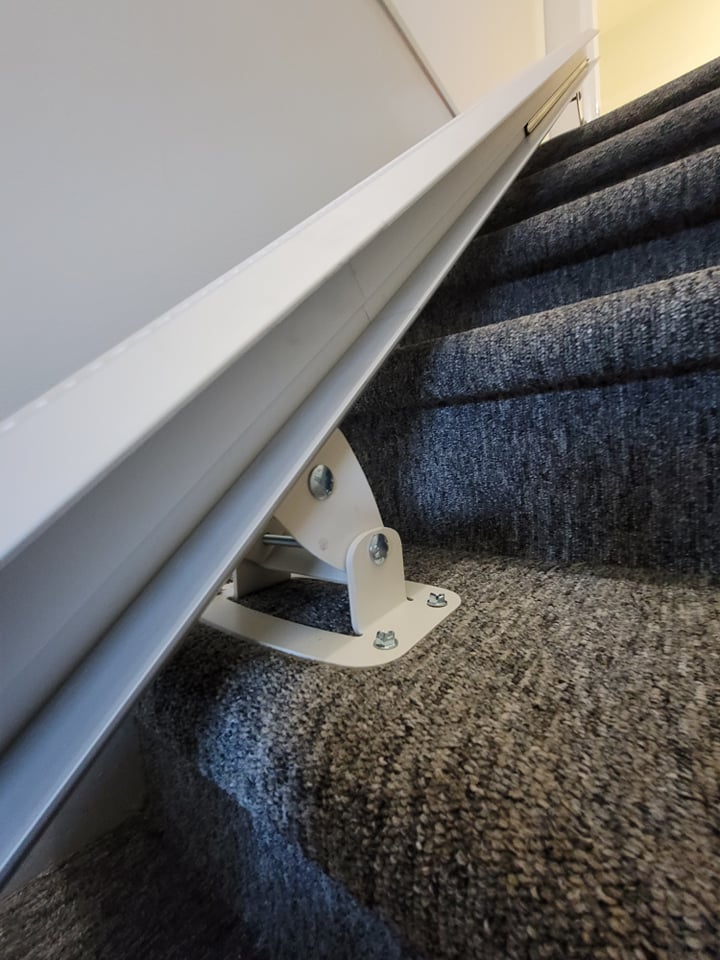 A stairlift bracket